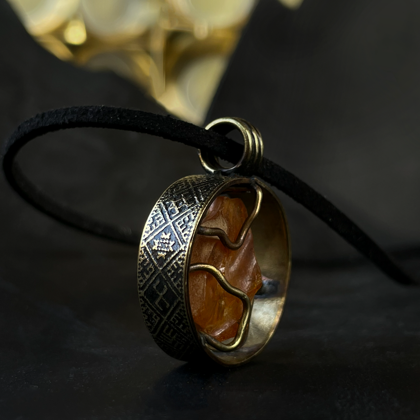 Pendant "Amber in a Cage"